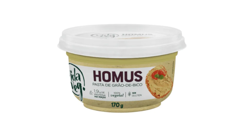 Imagem de homus, uma pasta de grão-de-bico vegana, sem glúten e rica em proteínas, apresentada em embalagem de 170g.