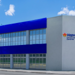 Fachada azul e branca do prédio da Hapvida Clínica e Diagnóstico Campinas.